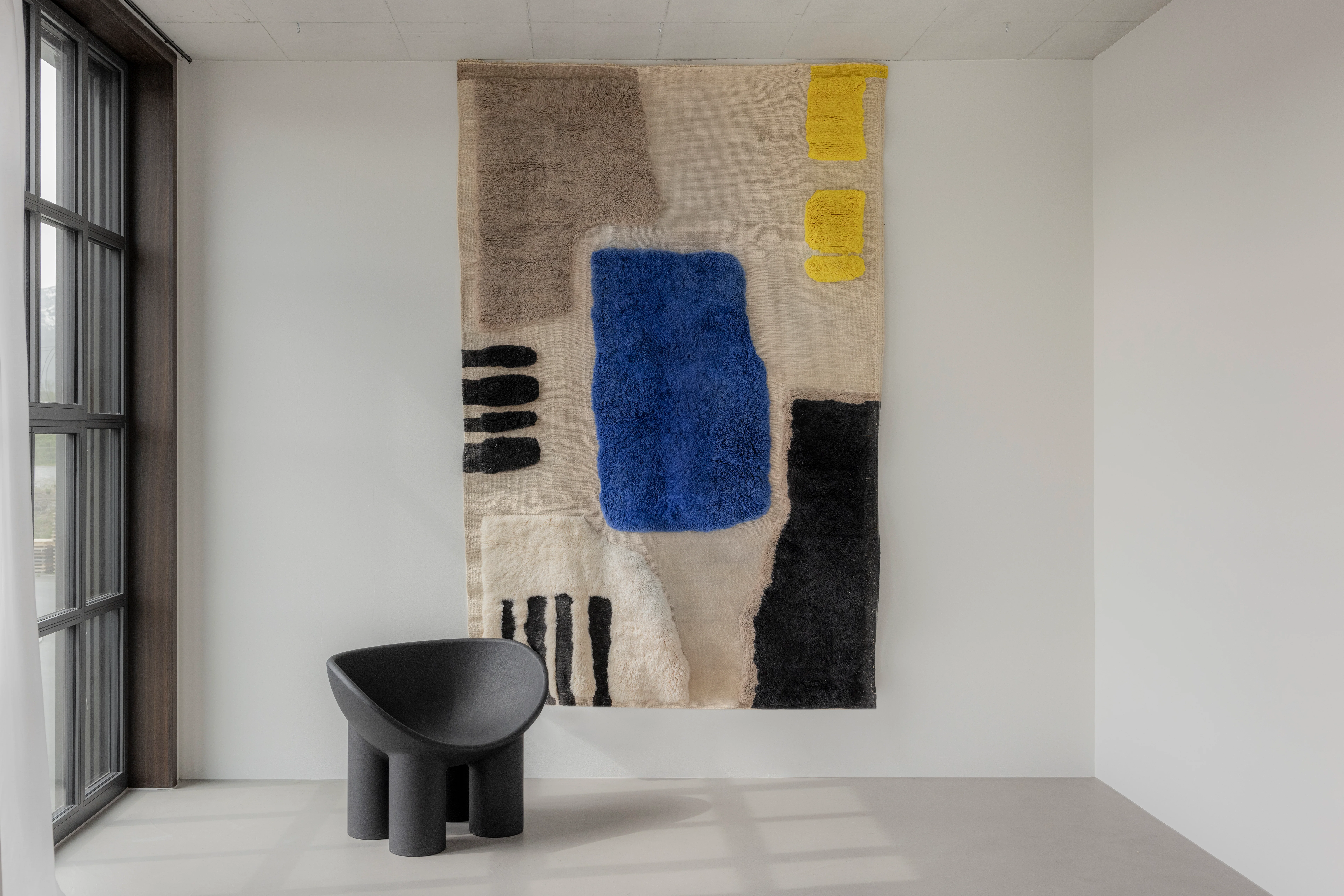 Abstrakte Wandarbeit aus blauer und gelber Wolle, geometrisches Design